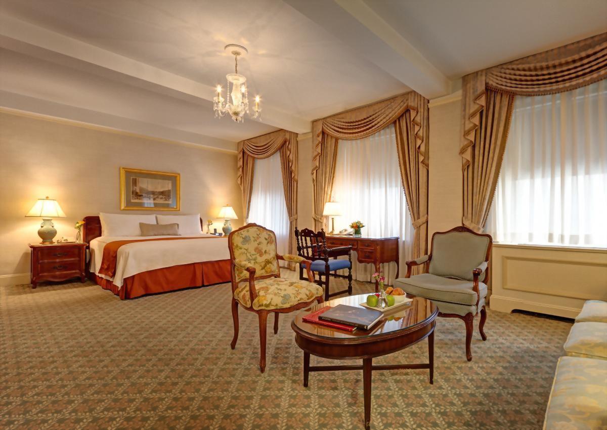 Junior Suite with 1 King Bed and 1 Queen size sofa bed at the Hotel Elysee.  Approximately 450 square feet and suitable for up to 3 adults.