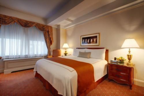 Deluxe King Room with 1 King size bed at the Hotel Elysee in Manhattan.  Approximately 300 square feet and suitable for up to 2 adult guests.