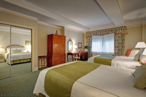 Deluxe Double Room with 2 Double beds at the Hotel Elysee in Midtown.  Approximately 300 square feet and suitable for 2 adults or 1 adult and 1 child.
