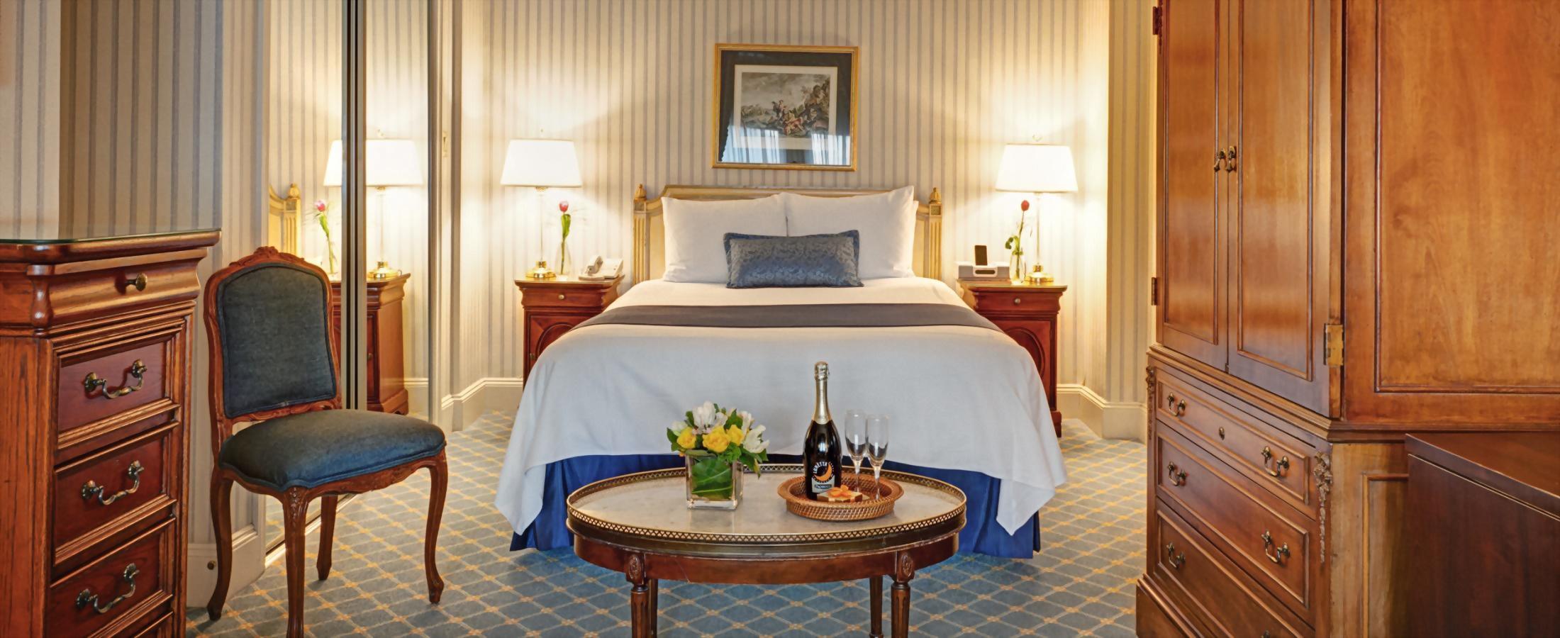 Deluxe Queen Room at Hotel Elysée has one queen bed and is approximately 300 square feet.