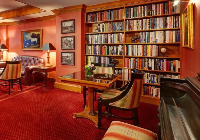 At the Hotel Elysee in New York City the library and Club Room are open all day for our guests.  We encourage our guests to enjoy coffee, tea, fruit and cookies all day.