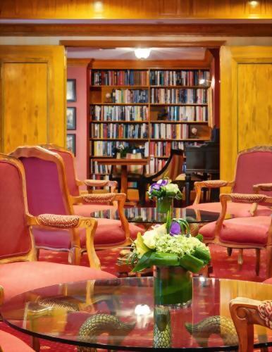 A peak into the Library at the Hotel Elysee by Library Hotel Collection.  We encourage guests to take a book or leave a book.