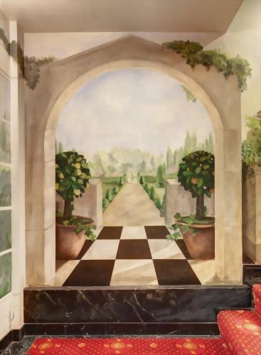 As you approach the top of the staircase in the Lobby of the Hotel Elysee you will come across beautiful murals that make you feel like you might just be in the heart of France.