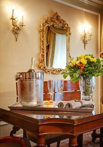 Enjoy a bottle of champagne in the dining room area of the Presidential Suite honoring Tennessee Williams.  This suite offers approximately 900 square feet of living space with a walk in closet!