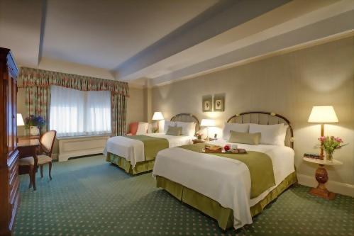 Enjoy your own bed in a deluxe double room, perfect for friends traveling together.