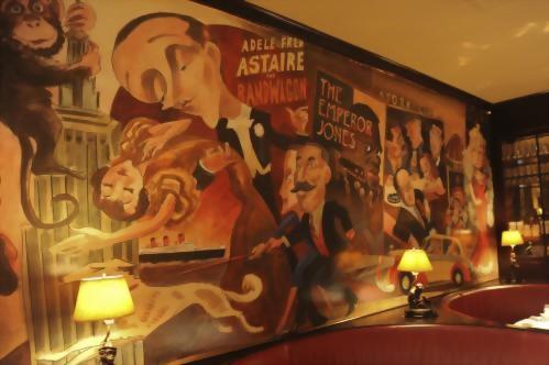 The famous mural in the Monkey Bar was painted in the early 50's by caricaturist Charlie Wala. In successive years, other artists have added to the tableau, keeping the Monkey Bar as polished as it always was in days gone by.