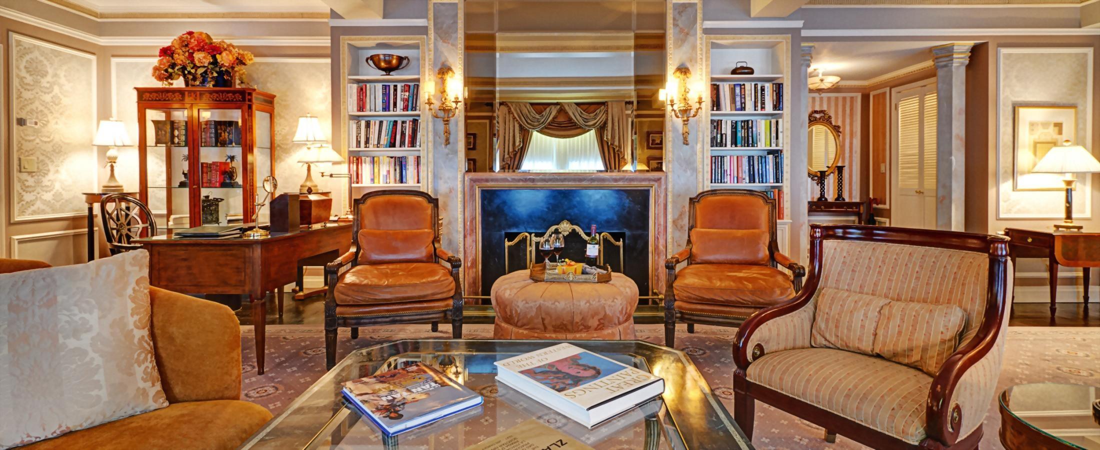 The living room of the Vaclav Havel Suite at the Hotel Elysée has a beautiful non-working fireplace.