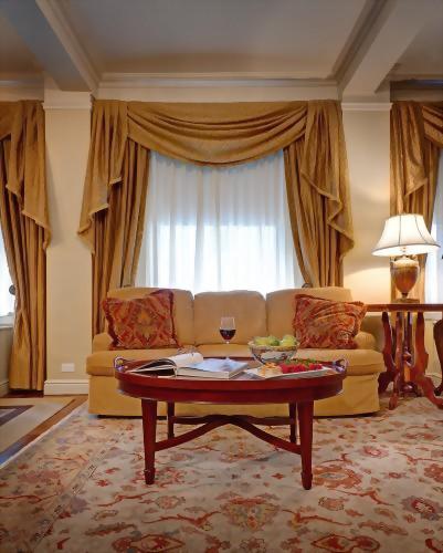 The living room of the Presidential Suite honoring Tennessee Williams is the only Presidential Suite at the Hotel Elysee by Library Hotel Collection with a pull out sofa bed to accommodate a child or an additional adult.