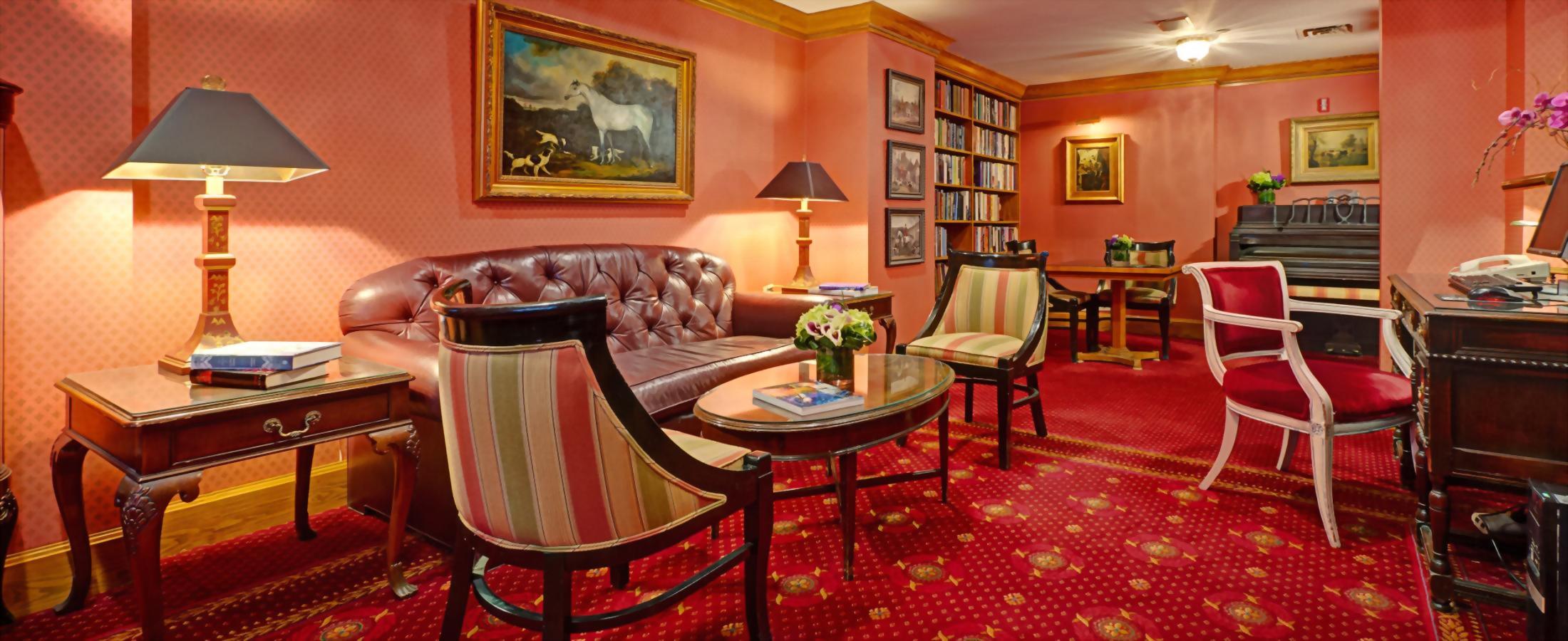 The library at the Hotel Elysee in New York is open for all guests to use the computer or borrow a book.